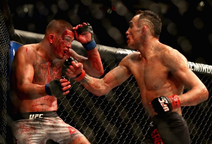 Tony Ferguson throws a punch at Anthony Pettis in their lightweight bout during the UFC 229 event inside T-Mobile Arena on October 6, 2018 in Las Vegas, Nevada.