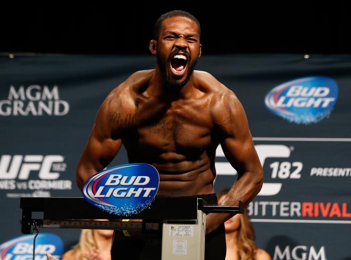 LAS VEGAS, NV - JANUARY 02: UFC light heavyweight champion Jon "Bones" Jones poses on the scale after weighing in during the UFC 182 weigh-in event at the MGM Grand Conference Center on January 2, 2015 in Las Vegas, Nevada. (Photo by Josh Hedges/Zuffa LLC via Getty Images)