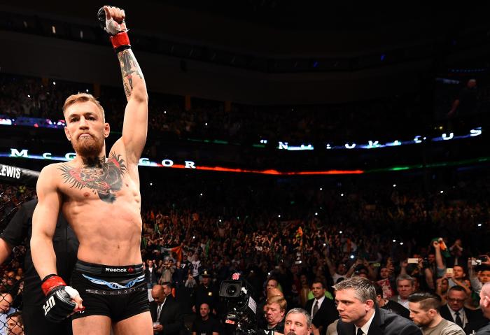 BOSTON, MA - JANUARY 18: Conor McGregor of Ireland reacts as he enters the Octagon before a featherweight fight against Dennis Siver of Germany during the UFC Fight Night event at the TD Garden on January 18, 2015 in Boston, Massachusetts. (Photo by Jeff Bottari/Zuffa LLC/Zuffa LLC via Getty Images)