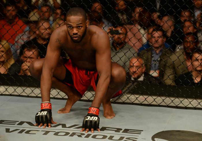 BALTIMORE, MD - APRIL 26: Jon "Bones" Jones crouches in the Octagon before his light heavyweight championship bout against Glover Teixeira during the UFC 172 event at the Baltimore Arena on April 26, 2014 in Baltimore, Maryland. (Photo by Patrick Smith/Zuffa LLC via Getty Images)