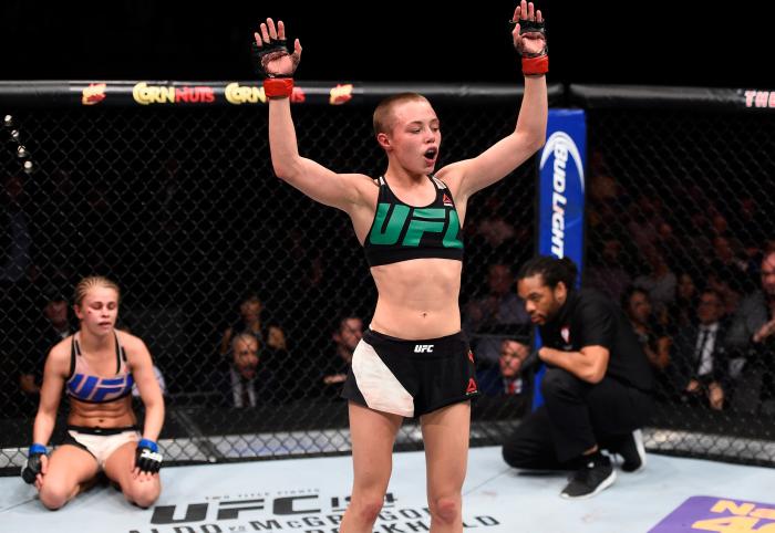 LAS VEGAS, NEVADA - DECEMBER 10: (R-L) Rose Namajunas celebrates her submission victory over Paige VanZant in their women's strawweight bout during the UFC Fight Night event at The Chelsea at the Cosmopolitan of Las Vegas on December 10, 2015 in Las Vegas, Nevada. (Photo by Jeff Bottari/Zuffa LLC via Getty Images)