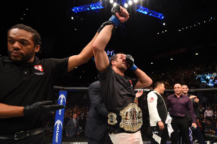 LAS VEGAS, NV - DECEMBER 12: Luke Rockhold reacts to his victory over Chris Weidman in their UFC middleweight championship bout during the UFC 194 event inside MGM Grand Garden Arena on December 12, 2015 in Las Vegas, Nevada. (Photo by Josh Hedges/Zuffa LLC/Zuffa LLC via Getty Images)