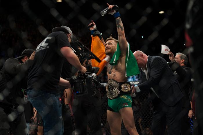 LAS VEGAS, NV - DECEMBER 12: UFC featherweight champion Conor McGregor celebrates his 13 second knockout victory over Jose Aldo in their featherweight championship fight during the UFC 194 event inside MGM Grand Garden Arena on December 12, 2015 in Las Vegas, Nevada. (Photo by Brandon Magnus/Zuffa LLC/Zuffa LLC via Getty Images)