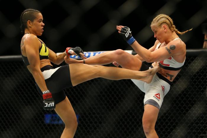LAS VEGAS, NV - MARCH 5: Amanda Nunes (L) kickes Valentina Shevchenko during UFC 196 at the MGM Grand Garden Arena on March 5, 2016 in Las Vegas, Nevada. (Photo by Rey Del Rio/Getty Images)