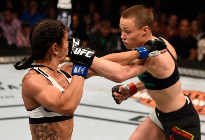TAMPA, FL - APRIL 16: (R-L) Rose Namajunas punches Tecia Torres in their women's strawweight bout during the UFC Fight Night event at Amalie Arena on April 16, 2016 in Tampa, Florida. (Photo by Jeff Bottari/Zuffa LLC via Getty Images)