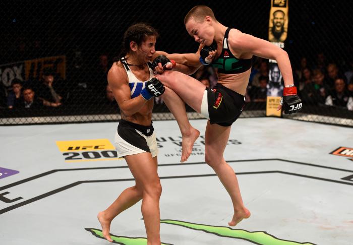 TAMPA, FL - APRIL 16: (R-L) Rose Namajunas knees Tecia Torres in their women's strawweight bout during the UFC Fight Night event at Amalie Arena on April 16, 2016 in Tampa, Florida. (Photo by Jeff Bottari/Zuffa LLC via Getty Images)