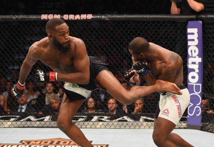 Jon Jones kicks Ovince Saint Preux in their interim UFC light heavyweight championship bout during the UFC 197 event inside MGM Grand Garden Arena on April 23, 2016 in Las Vegas, Nevada.