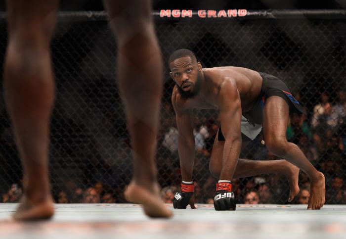 Jon Jones approaches Ovince Saint Preux in their interim UFC light heavyweight championship bout during the UFC 197 event inside MGM Grand Garden Arena on April 23, 2016 in Las Vegas, Nevada.
