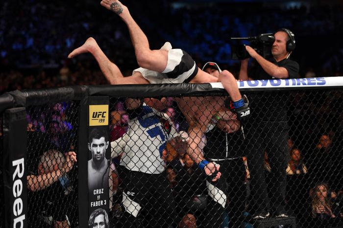 CURITIBA, BRAZIL - MAY 14: Stipe Miocic celebrates after defeating Fabricio Werdum of Brazil by KO in their UFC heavyweight championship bout during the UFC 198 event at Arena da Baixada stadium on May 14, 2016 in Curitiba, Parana, Brazil. (Photo by Josh Hedges/Zuffa LLC/Zuffa LLC via Getty Images)