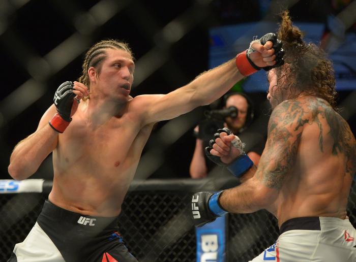 Brian Ortega punches Clay Guida at The Forum on June 4, 2016 in Inglewood, California.