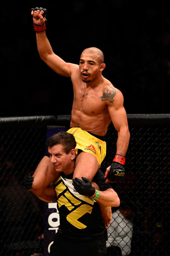 Jose Aldo celebrates after fighting Frankie Edgar in their UFC interim featherweight championship bout during the UFC 200 event on July 9, 2016 at T-Mobile Arena in Las Vegas, Nevada.