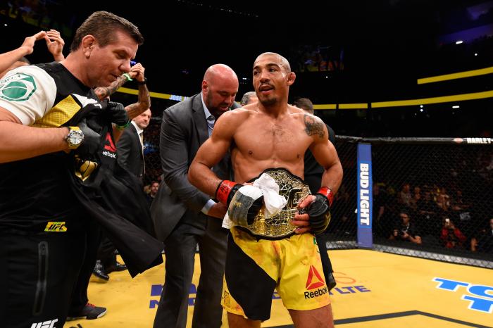 Jose Aldo with the championship belt after the UFC interim featherweight championship bout during the UFC 200 event on July 9, 2016 at T-Mobile Arena in Las Vegas, Nevada.