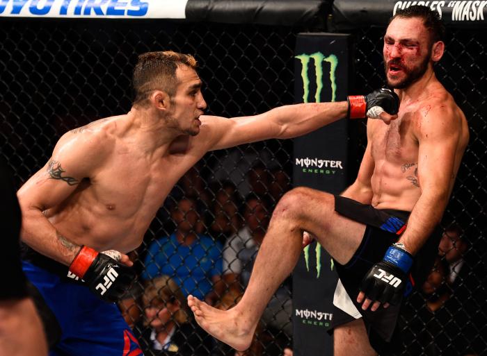 SIOUX FALLS, SD - JULY 13: (L-R) Tony Ferguson punches Lando Vannat in their lightweight bout during the UFC Fight Night event on July 13, 2016 at Denny Sanford Premier Center in Sioux Falls, South Dakota. (Photo by Jeff Bottari/Zuffa LLC via Getty Images)