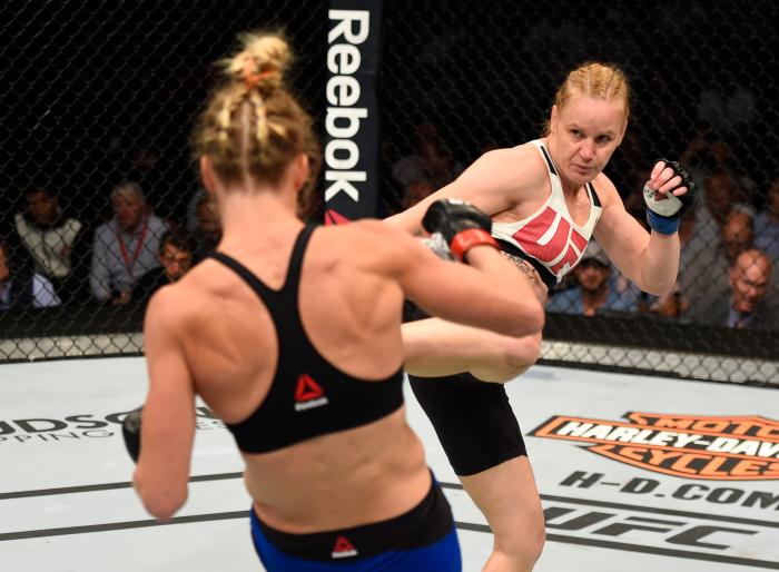 CHICAGO, IL - JULY 23: (R-L) Valentina Shevchenko of Kyrgyzstan kicks Holly Holm in their women's bantamweight bout during the UFC Fight Night event at the United Center on July 23, 2016 in Chicago, Illinois. (Photo by Josh Hedges/Zuffa LLC via Getty Images)