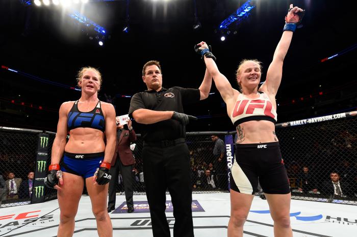 CHICAGO, IL - JULY 23: (R-L) Valentina Shevchenko of Kyrgyzstan celebrates after defeating Holly Holm by unanimous decision in their women's bantamweight bout during the UFC Fight Night event at the United Center on July 23, 2016 in Chicago, Illinois. (Photo by Josh Hedges/Zuffa LLC via Getty Images)
