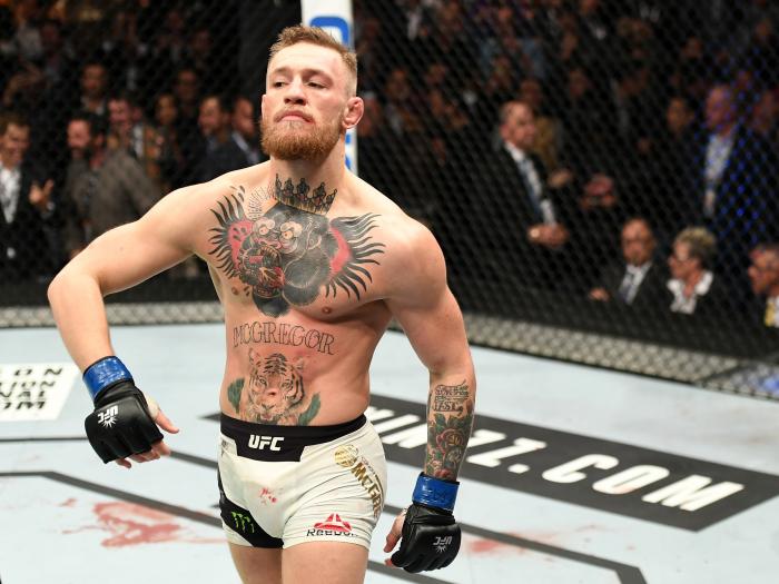 NEW YORK, NY - NOVEMBER 12: Conor McGregor of Ireland celebrates his KO victory over Eddie Alvarez of the United States in their lightweight championship bout during the UFC 205 event at Madison Square Garden on November 12, 2016 in New York City. (Photo by Jeff Bottari/Zuffa LLC/Zuffa LLC via Getty Images)