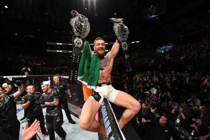 NEW YORK, NY - NOVEMBER 12: UFC lightweight and featherweight champion Conor McGregor of Ireland celebrates after defeating Eddie Alvarez in their UFC lightweight championship fight during the UFC 205 event at Madison Square Garden on November 12, 2016 in New York City. (Photo by Jeff Bottari/Zuffa LLC/Zuffa LLC via Getty Images)