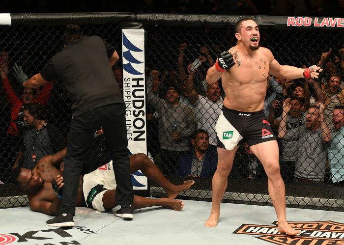 MELBOURNE, AUSTRALIA - NOVEMBER 27: Robert Whittaker of New Zealand celebrates his TKO victory over Derek Brunson in their middleweight bout during the UFC Fight Night event at Rod Laver Arena on November 27, 2016 in Melbourne, Australia. (Photo by Jeff Bottari/Zuffa LLC via Getty Images)