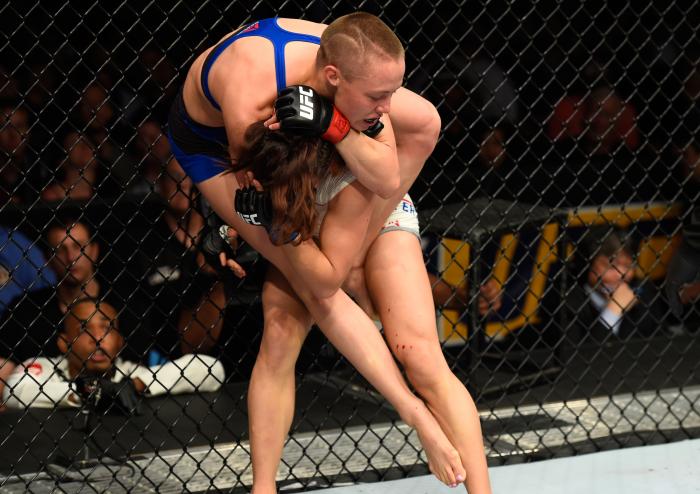 KANSAS CITY, MO - APRIL 15: (L-R) Rose Namajunas attempts to submit Michelle Waterson in their women's strawweight fight during the UFC Fight Night event at Sprint Center on April 15, 2017 in Kansas City, Missouri. (Photo by Josh Hedges/Zuffa LLC via Getty Images)
