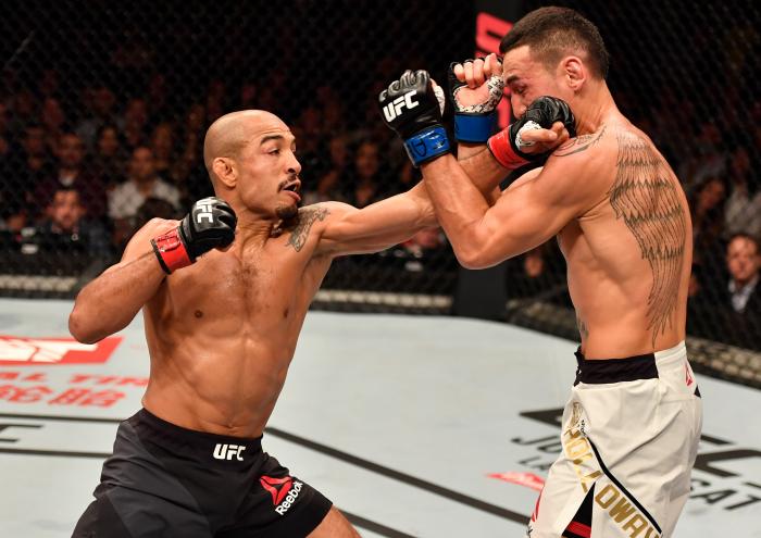 RIO DE JANEIRO, BRAZIL - JUNE 03: (L-R) Jose Aldo of Brazil punches Max Holloway in their UFC featherweight championship bout during the UFC 212 event at Jeunesse Arena on June 3, 2017 in Rio de Janeiro, Brazil. (Photo by Jeff Bottari/Zuffa LLC via Getty Images)