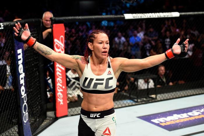 Cris Cyborg celebrates her win over Tonya Evinger in their UFC women's featherweight championship bout during the UFC 214 event at Honda Center on July 29, 2017 in Anaheim, California.