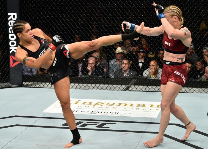 EDMONTON, AB - SEPTEMBER 09: (L-R) Amanda Nunes of Brazil kicks Valentina Shevchenko of Kyrgyzstan in their women's bantamweight bout during the UFC 215 event inside the Rogers Place on September 9, 2017 in Edmonton, Alberta, Canada. (Photo by Jeff Bottari/Zuffa LLC via Getty Images)