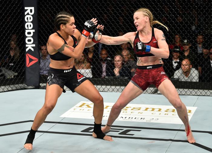 EDMONTON, AB - SEPTEMBER 09: (R-L) Valentina Shevchenko of Kyrgyzstan punches Amanda Nunes of Brazil in their women's bantamweight bout during the UFC 215 event inside the Rogers Place on September 9, 2017 in Edmonton, Alberta, Canada. (Photo by Jeff Bottari/Zuffa LLC via Getty Images)