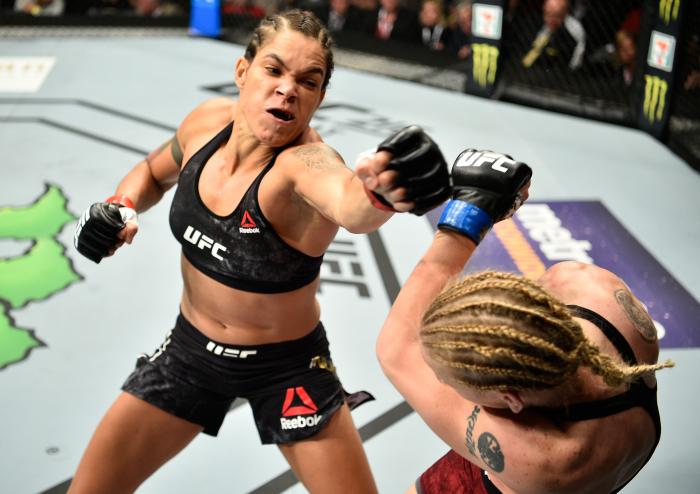 EDMONTON, AB - SEPTEMBER 09: (L-R) Amanda Nunes of Brazil punches Valentina Shevchenko of Kyrgyzstan in their women's bantamweight bout during the UFC 215 event inside the Rogers Place on September 9, 2017 in Edmonton, Alberta, Canada. (Photo by Jeff Bottari/Zuffa LLC via Getty Images)