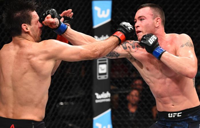 SAO PAULO, BRAZIL - OCTOBER 28: (R-L) Colby Covington punches Demian Maia of Brazil in their welterweight bout during the UFC Fight Night event inside the Ibirapuera Gymnasium on October 28, 2017 in Sao Paulo, Brazil. (Photo by Josh Hedges/Zuffa LLC via Getty Images)