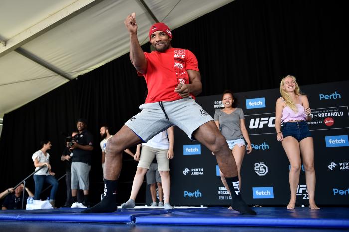 PERTH, AUSTRALIA - FEBRUARY 09: UFC middleweight Yoel Romero of Cuba (L) invites fans to dance on stage during the UFC 221 Open Workouts at Elizabeth Quay on February 9, 2018 in Perth, Australia. (Photo by Jeff Bottari/Zuffa LLC via Getty Images)