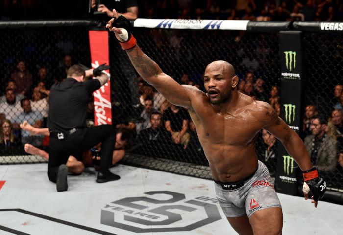 PERTH, AUSTRALIA - FEBRUARY 11: (R-L) Yoel Romero of Cuba celebrates his knockout victory over Luke Rockhold in their interim middleweight title bout during the UFC 221 event at Perth Arena on February 11, 2018 in Perth, Australia. (Photo by Jeff Bottari/Zuffa LLC via Getty Images)
