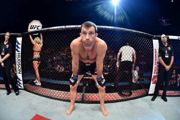 PERTH, AUSTRALIA - FEBRUARY 11: Luke Rockhold enters the Octagon before facing Yoel Romero of Cuba in their interim middleweight title bout during the UFC 221 event at Perth Arena on February 11, 2018 in Perth, Australia. (Photo by Jeff Bottari/Zuffa LLC/Zuffa LLC via Getty Images)