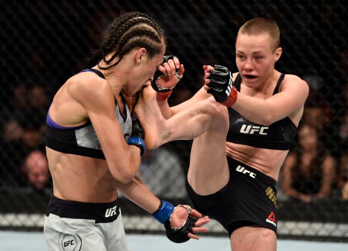 BROOKLYN, NEW YORK - APRIL 07: (R-L) Rose Namajunas kicks Joanna Jedrzejczyk of Poland in their women's strawweight title bout during the UFC 223 event inside Barclays Center on April 7, 2018 in Brooklyn, New York. (Photo by Jeff Bottari/Zuffa LLC via Getty Images)