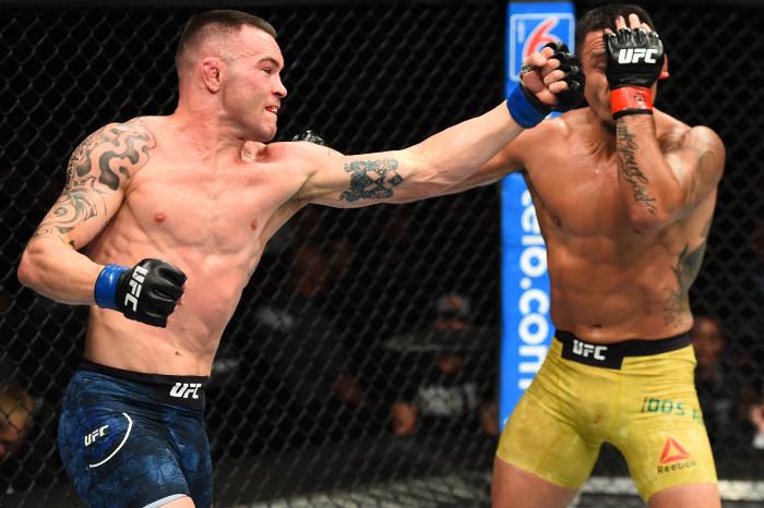 CHICAGO, ILLINOIS - JUNE 09: (L-R) Colby Covington punches Rafael Dos Anjos of Brazil in their interim welterweight title fight during the UFC 225 event at the United Center on June 9, 2018 in Chicago, Illinois. (Photo by Josh Hedges/Zuffa LLC via Getty Images)