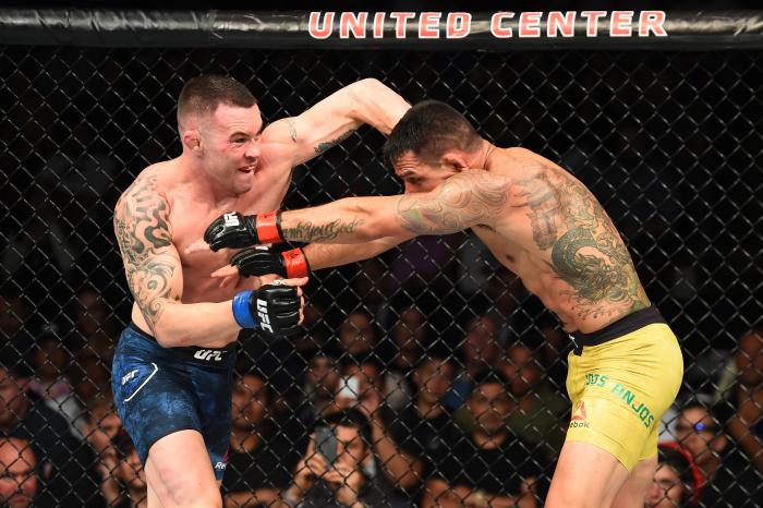 CHICAGO, ILLINOIS - JUNE 09: (L-R) Colby Covington punches Rafael Dos Anjos of Brazil in their interim welterweight title fight during the UFC 225 event at the United Center on June 9, 2018 in Chicago, Illinois. (Photo by Josh Hedges/Zuffa LLC via Getty Images)