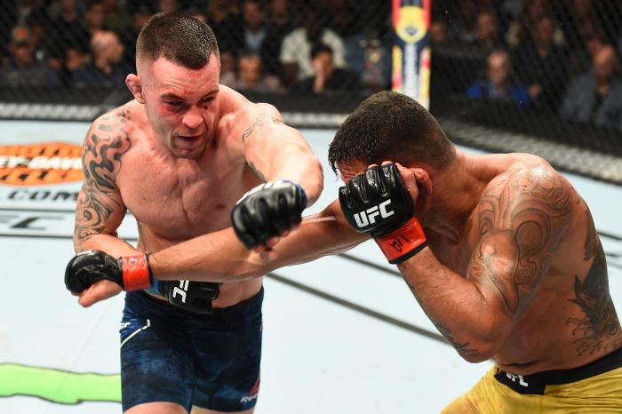 CHICAGO, ILLINOIS - JUNE 09: (L-R) Colby Covington punches Rafael Dos Anjos of Brazil in their interim welterweight title fight during the UFC 225 event at the United Center on June 9, 2018 in Chicago, Illinois. (Photo by Josh Hedges/Zuffa LLC via Getty Images)