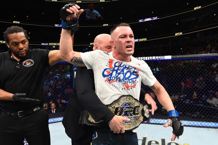 CHICAGO, ILLINOIS - JUNE 09: UFC President Dana White places the interim welterweight championship belt on Colby Covington after defeating Rafael Dos Anjos of Brazil in their interim welterweight title fight during the UFC 225 event at the United Center on June 9, 2018 in Chicago, Illinois. (Photo by Josh Hedges/Zuffa LLC via Getty Images)