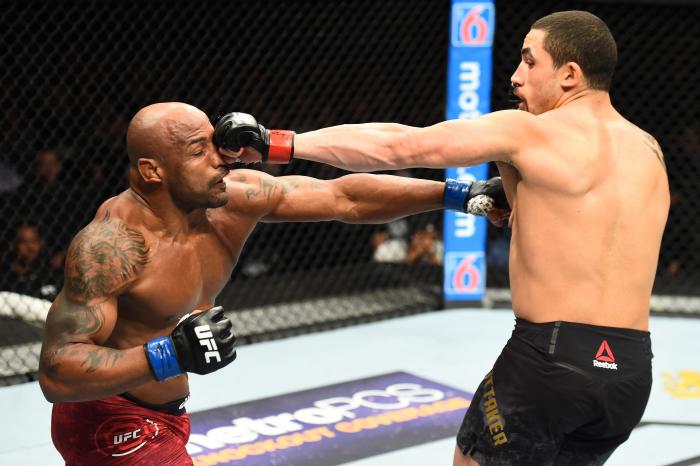 CHICAGO, ILLINOIS - JUNE 09: (R-L) Robert Whittaker of New Zealand punches Yoel Romero of Cuba in their middleweight fight during the UFC 225 event at the United Center on June 9, 2018 in Chicago, Illinois. (Photo by Josh Hedges/Zuffa LLC via Getty Images)