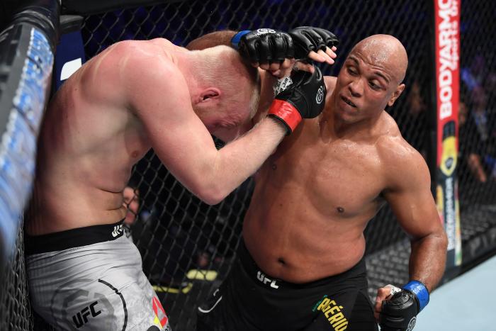 NEW YORK, NY - NOVEMBER 03: (R-L) Marcos Rogerio De Lima of Brazil punches Adam Wieczorek of Poland in their heavyweight bout during the UFC 230 event inside Madison Square Garden on November 3, 2018 in New York, New York. (Photo by Jeff Bottari/Zuffa LLC via Getty Images)