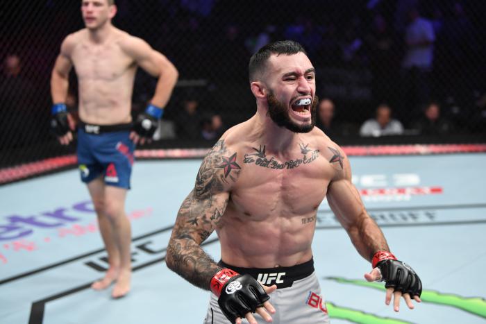 NEW YORK, NY - NOVEMBER 03: Shane Burgos celebrates his submission victory over Kurt Holobaugh in their featherweight bout during the UFC 230 event inside Madison Square Garden on November 3, 2018 in New York, New York. (Photo by Jeff Bottari/Zuffa LLC via Getty Images)