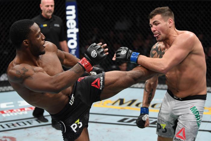 NEW YORK, NY - NOVEMBER 03: (L-R) Karl Roberson kicks Jack Marshman of South Wales in their middleweight bout during the UFC 230 event inside Madison Square Garden on November 3, 2018 in New York, New York. (Photo by Jeff Bottari/Zuffa LLC via Getty Images)