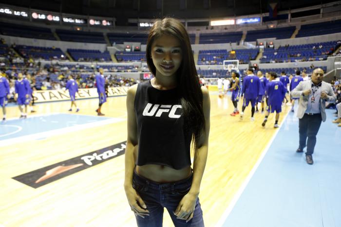 Octagon Girl Red Dela Cruz poses for a picture at the Smart Araneta Coliseum during the Manila UFC Tour on February 24, 2016 in Manila, Philippines. (Photo by Jeoffrey Maitem/Zuffa LLC)