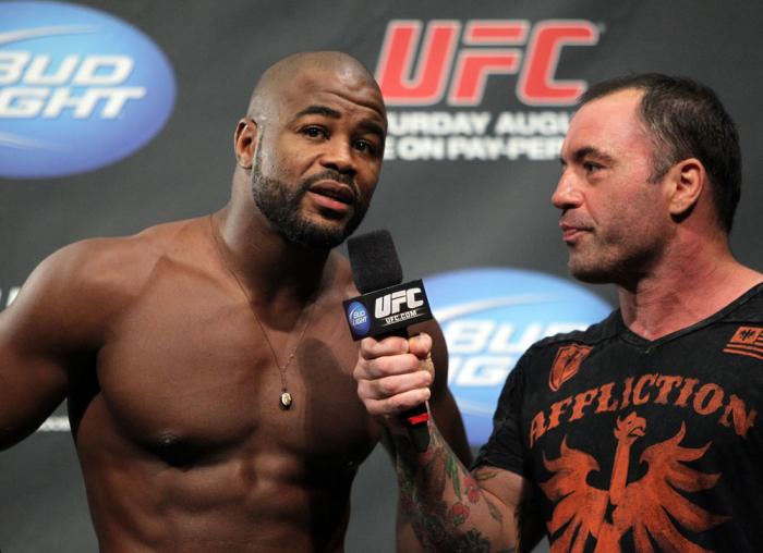 (R) Joe Rogan with (L) Rashad Evans