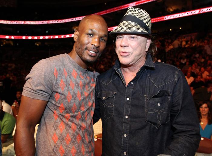 UFC 133: (L-R) Boxing champion Bernard Hopkins and actor Mickey Rourke pose for a photo octagonside at UFC 133.