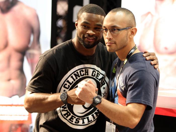 Strikeforce welterweight fighter Tyron Woodley poses for a photo with a fan