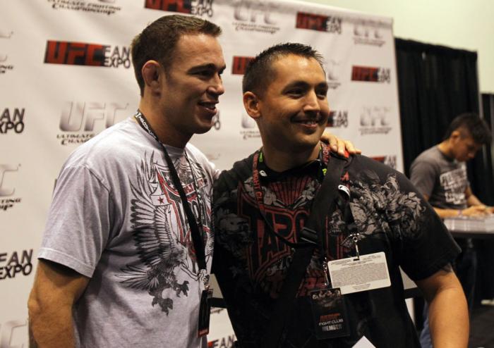 Jake Shields poses for a photo for a fan