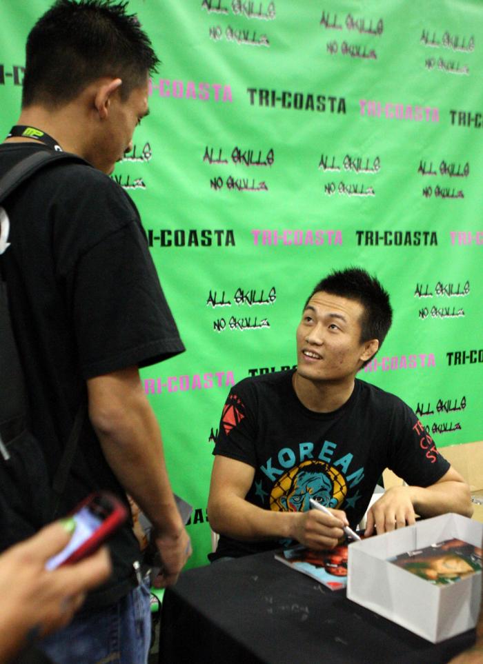"The Korean Zombie" Chan Sung Jung signs autographs
