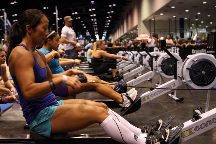 Athletes compete in the CrossFit competition at the UFC Fan Expo