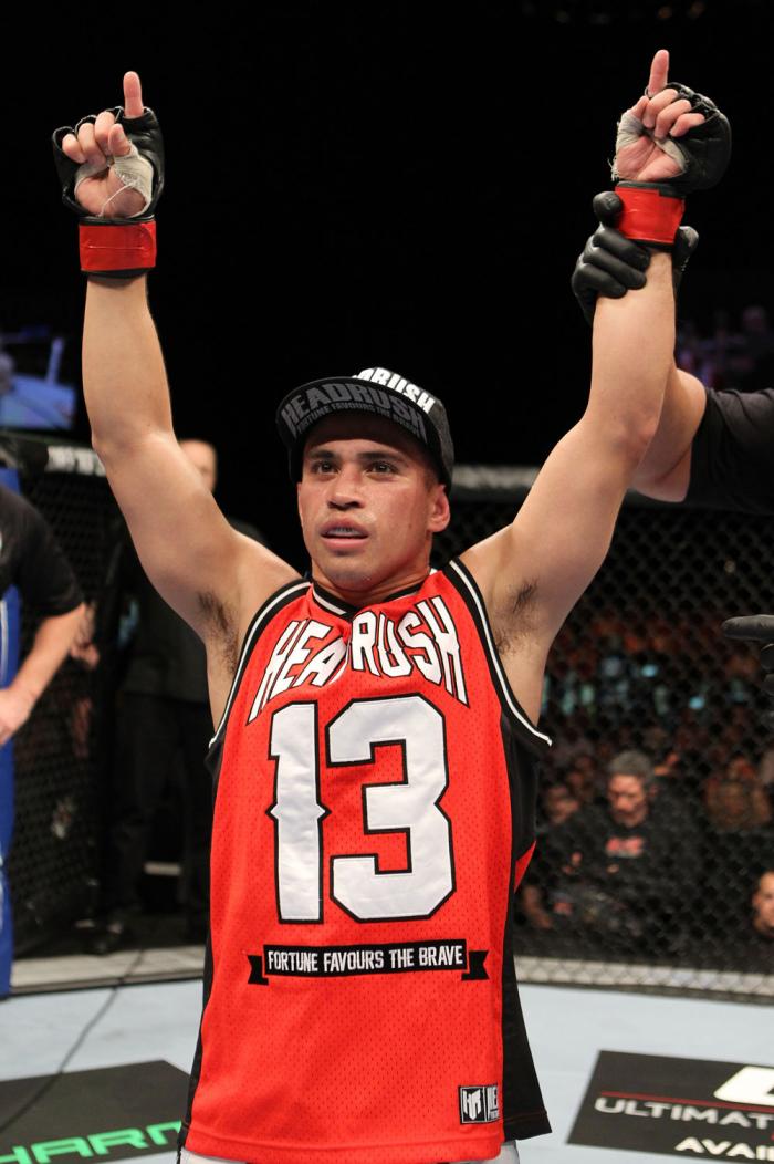 Chris Cariaso celebrates his win