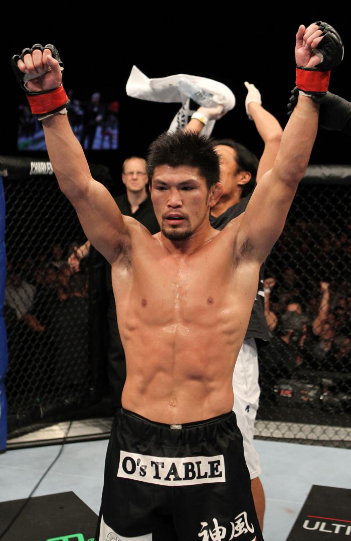 Michihiro Omigawa celebrates his win